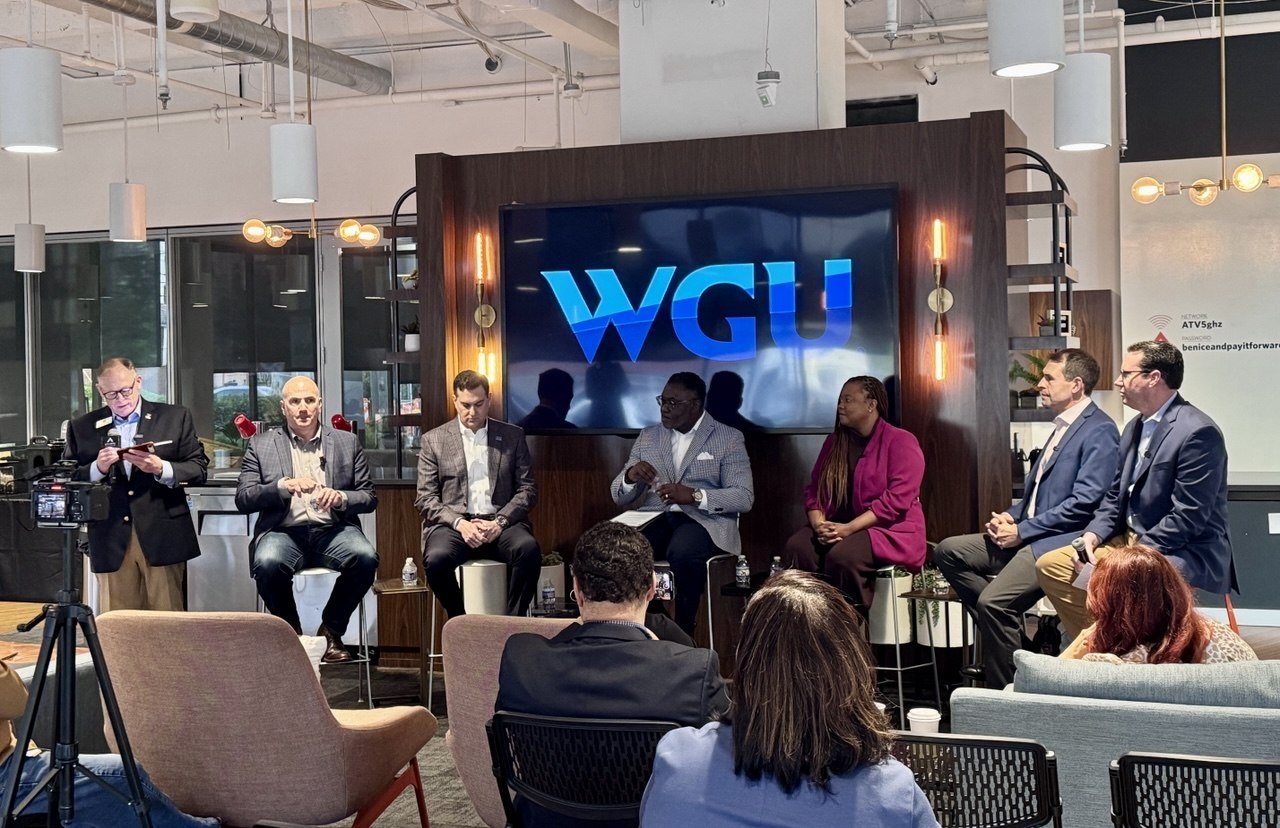 Full panel with camera crew and live audience — WGU Workforce Strategy event